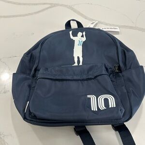 Navy Blue Backpack with Iconic Figure Design